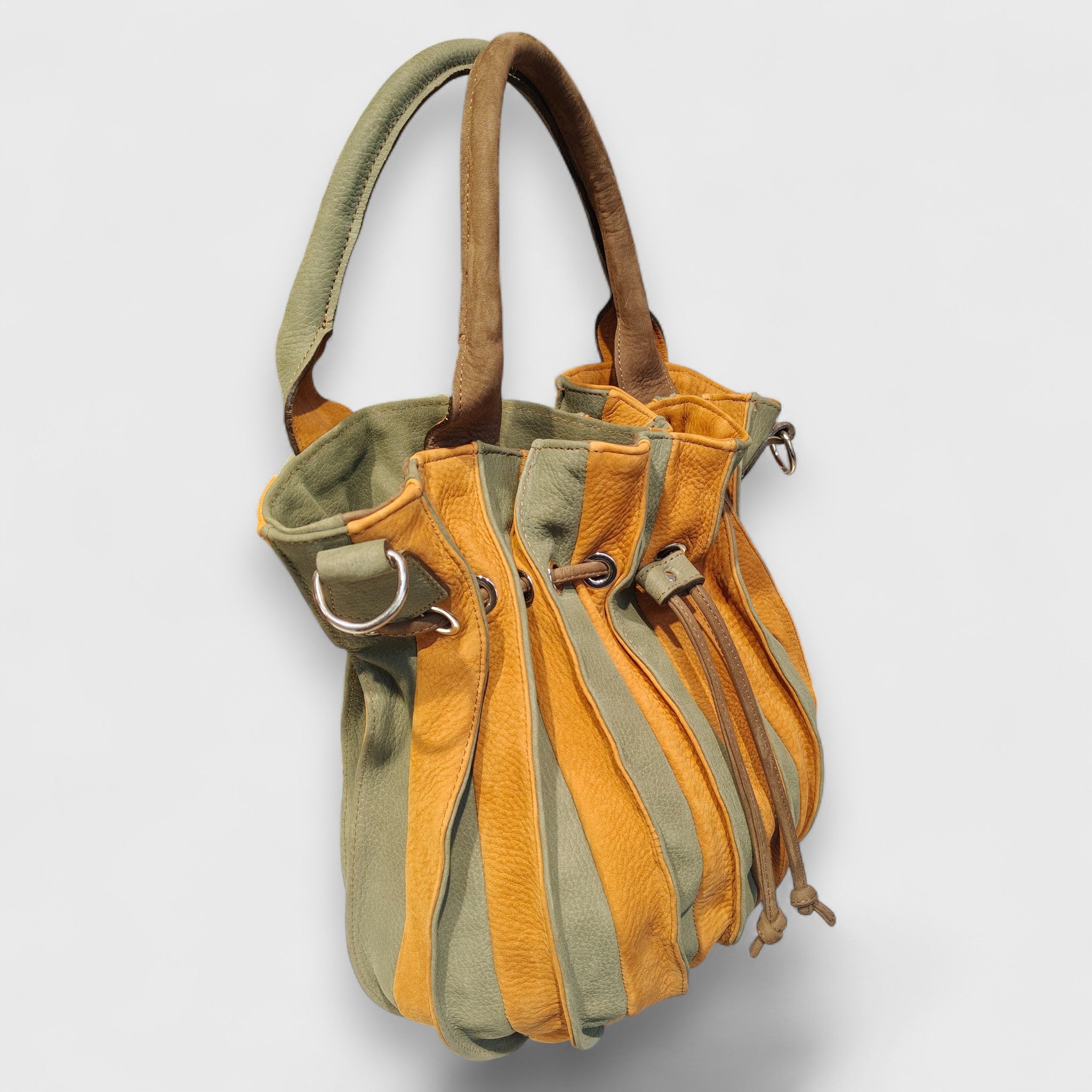 Pelletteria Pelle Nuda Milano, Artigianato italiano, Vera pelle, Negozio borse donna, Caramella verde