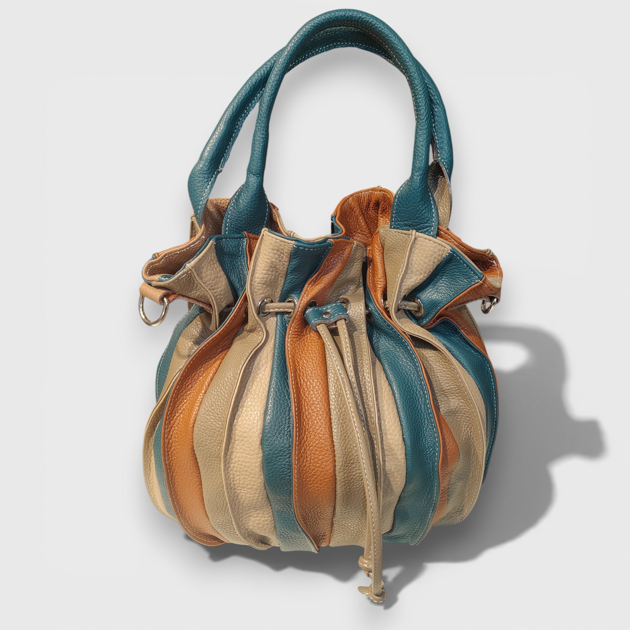 Pelletteria Pelle Nuda Milano, Artigianato Italiano, Vera pelle, Negozio borse donna, Caramella marrone-blu