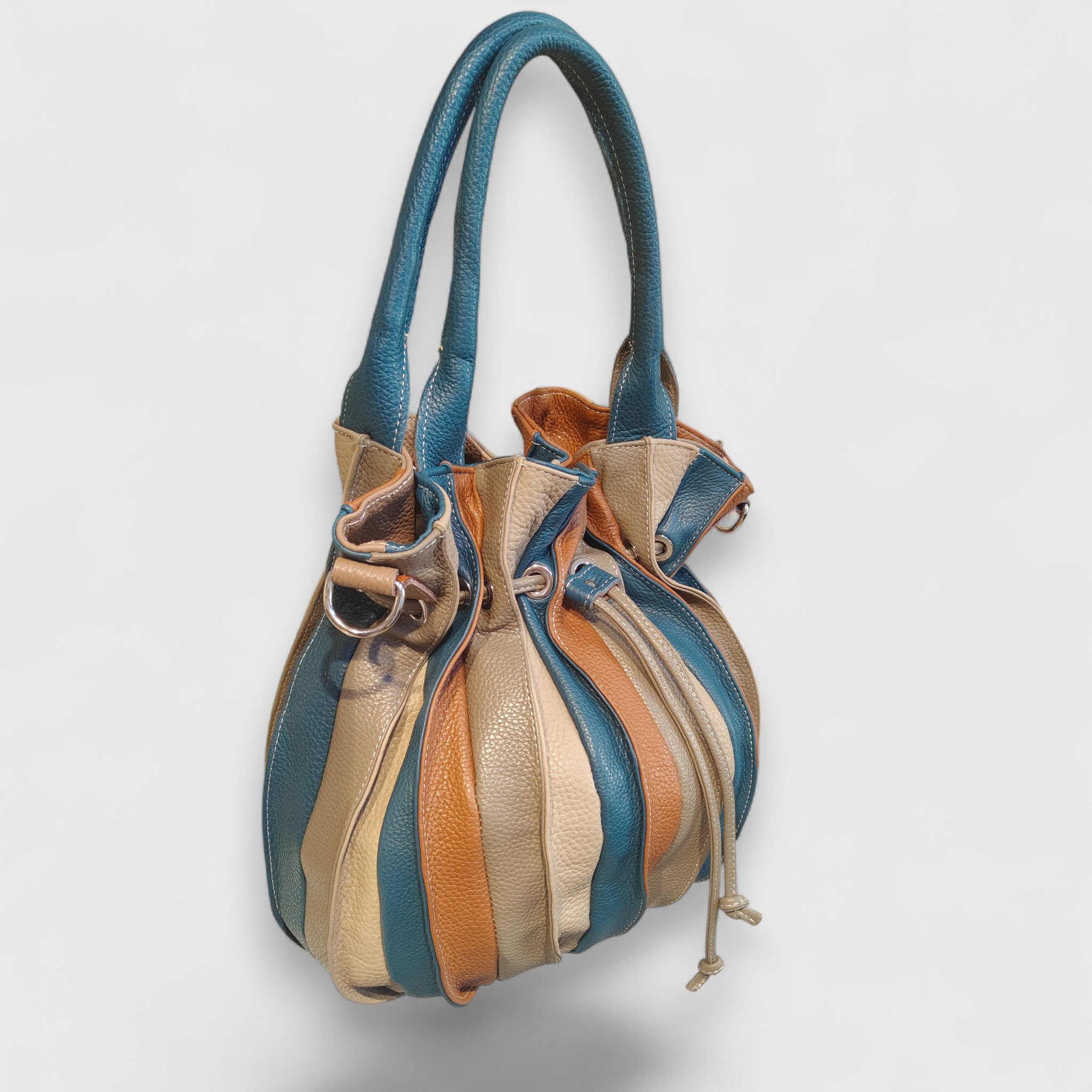 Pelletteria Pelle Nuda Milano, Artigianato Italiano, Vera pelle, Negozio borse donna, Caramella marrone-blu