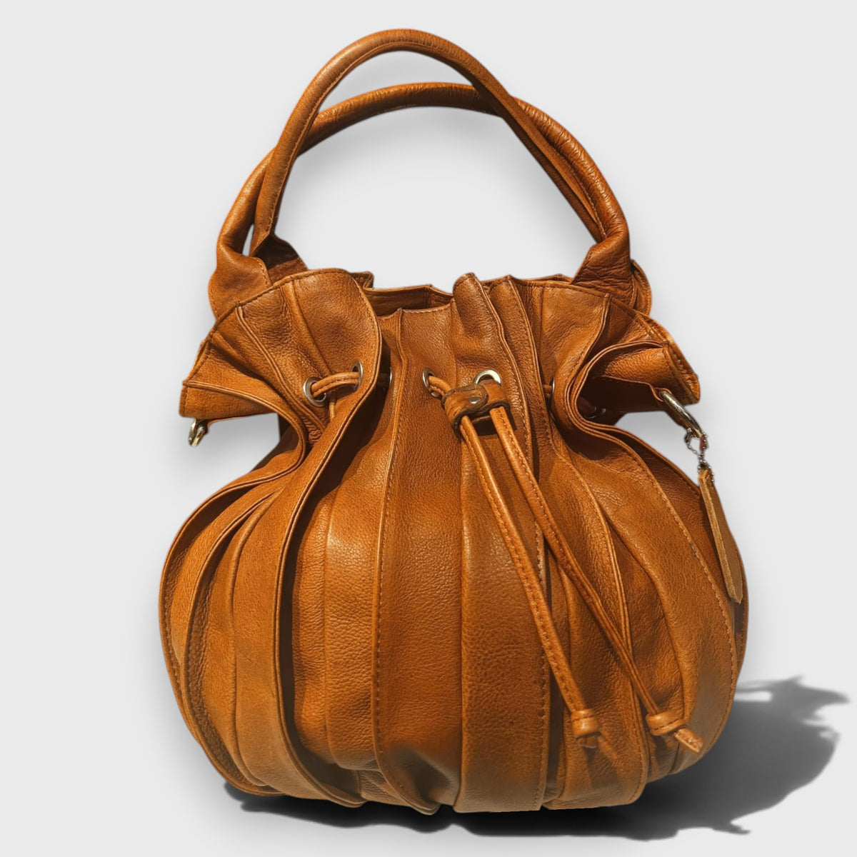 Pelletteria Pelle Nuda Milano, vera pelle italiana, Negozio borse donna, Caramella marrone chiaro