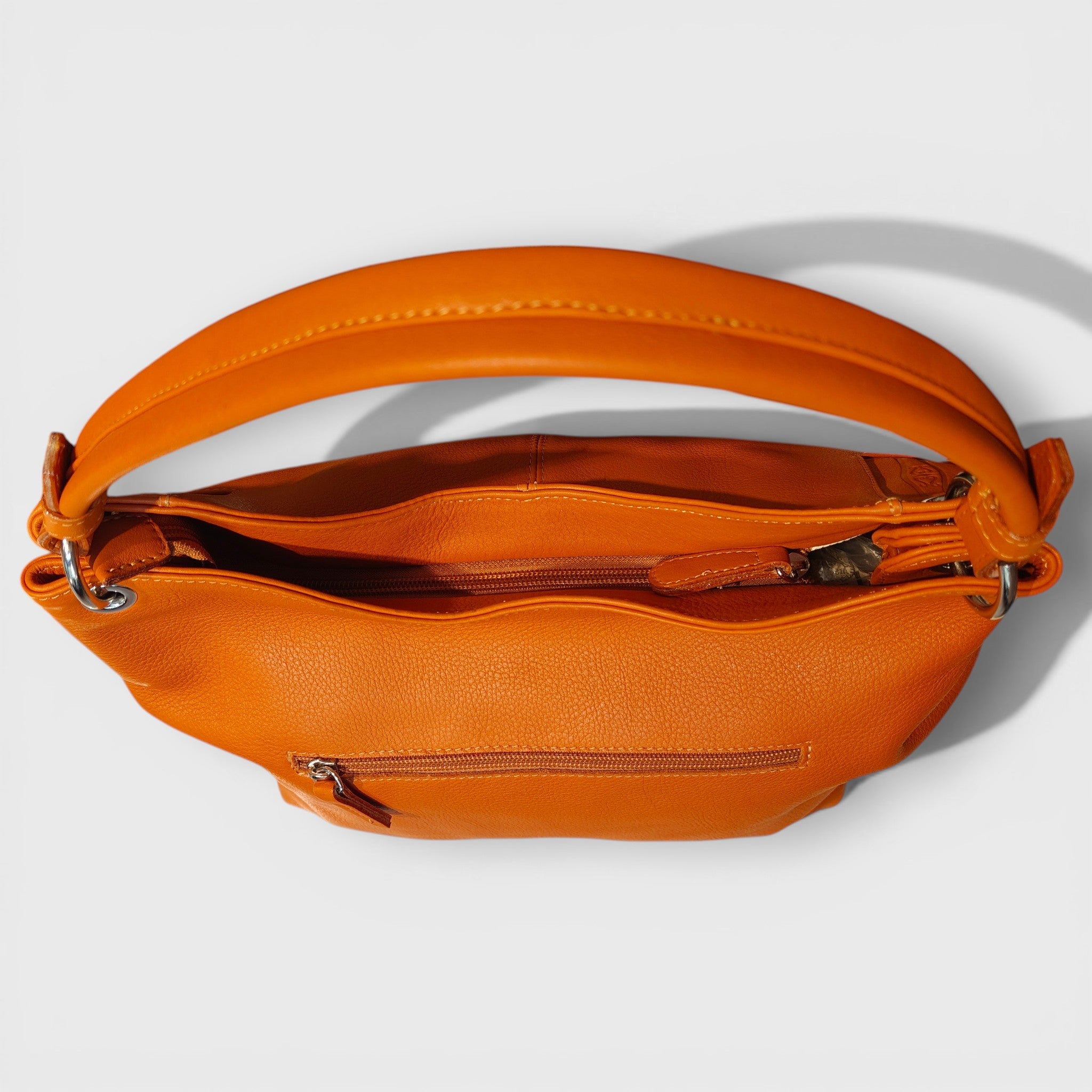 Pelletteria Pelle Nuda Milano, Artigianato Italiano, Vera Pelle, Negozio borse donna, Cris arancione
