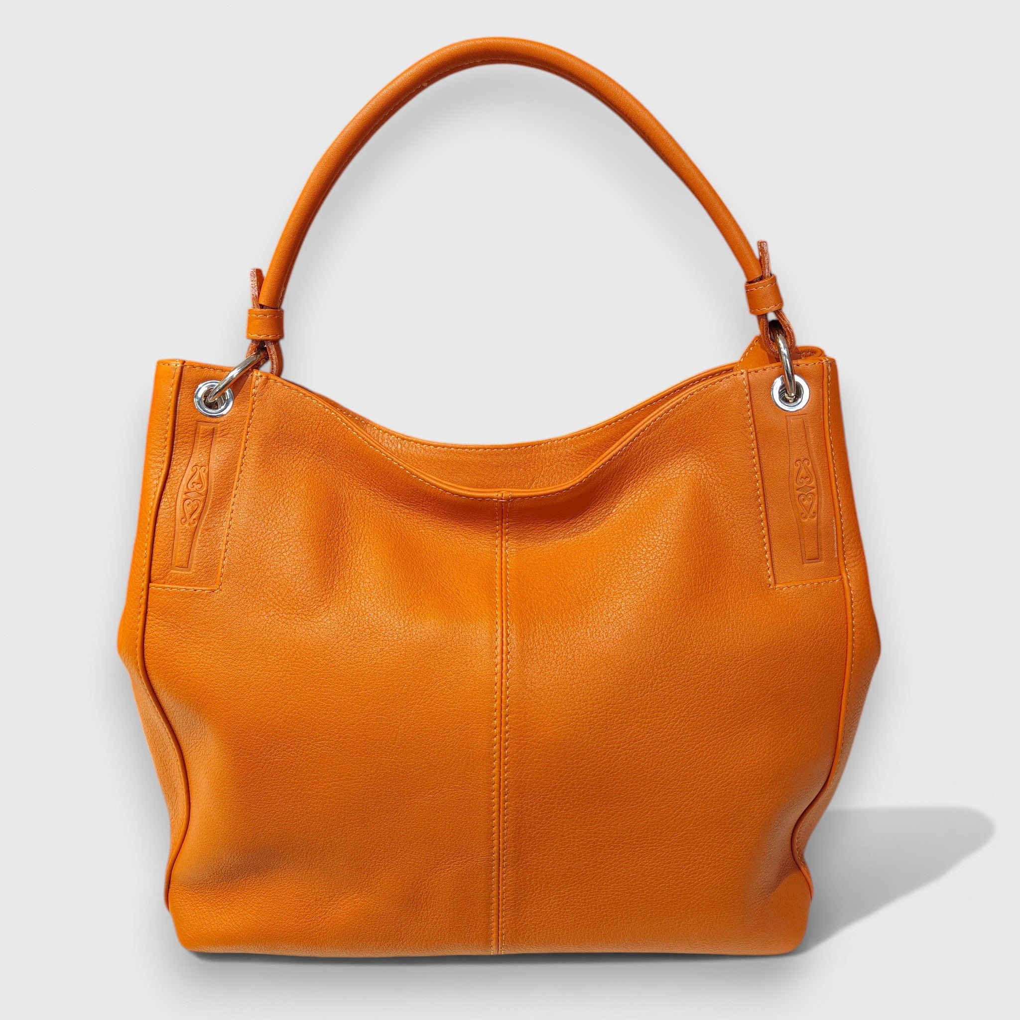 Pelletteria Pelle Nuda Milano, Artigianato Italiano, Vera Pelle, Negozio borse donna, Cris arancione