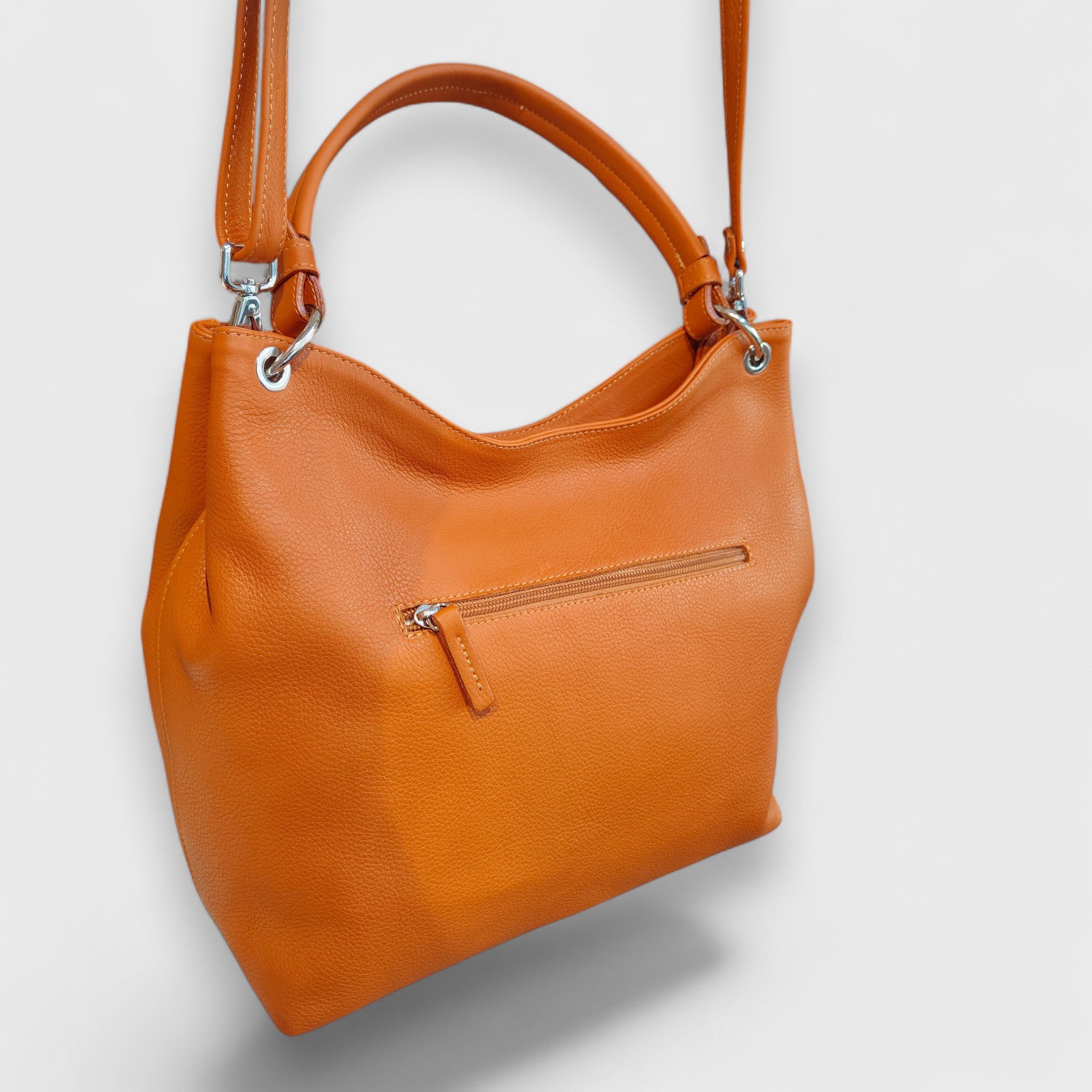 Pelletteria Pelle Nuda Milano, Artigianato Italiano, Vera Pelle, Negozio borse donna, Cris arancione