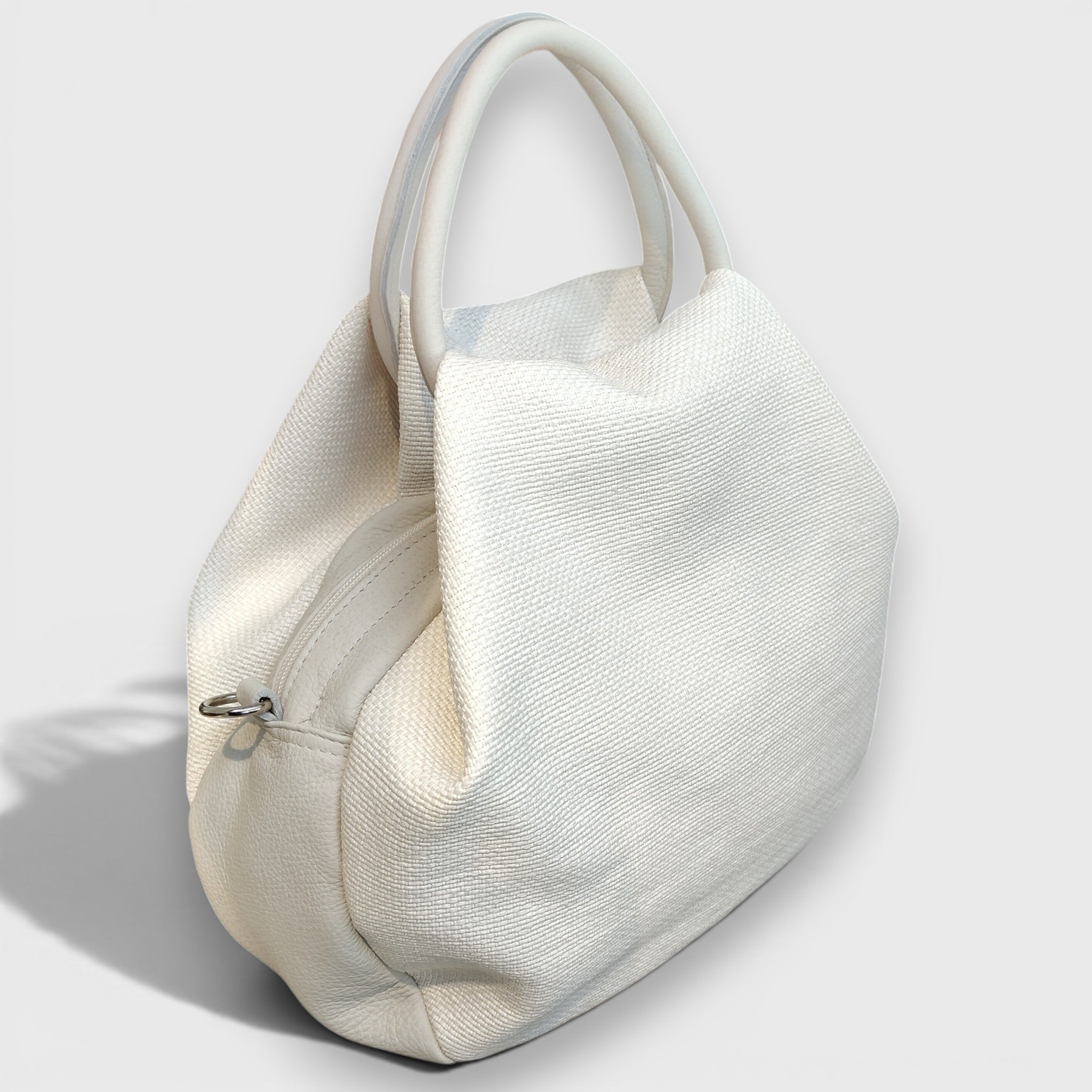 Pelletteria Pelle Nuda Milano, vera pelle italiana, Negozio borse donna, Frida rafia bianco