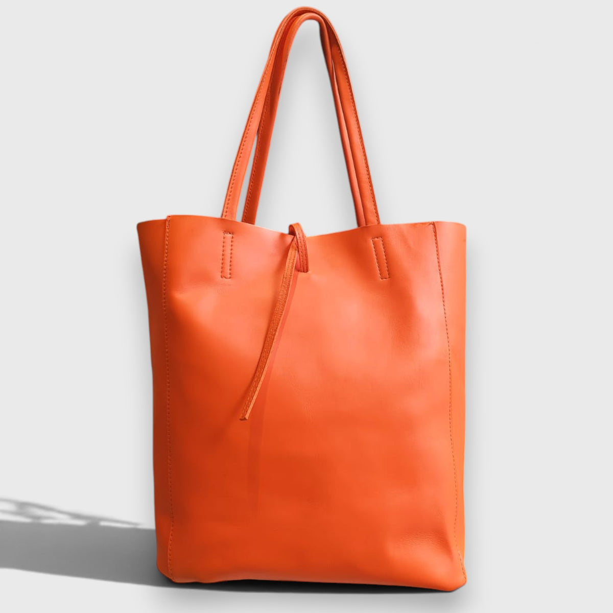 Pelletteria Pelle Nuda Milano, Vera pelle italiana, Negozio borse donna, Giulia arancione