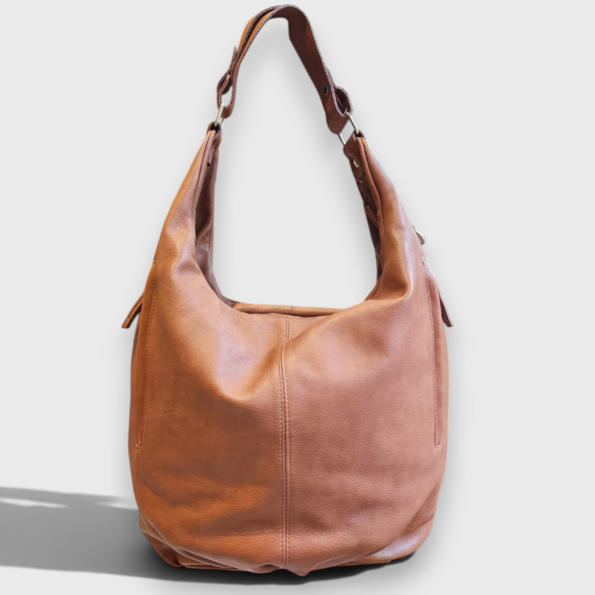 Pelletteria Pelle Nuda Milano, Vera pelle Italiana, Negozio borse donna, Sacca Croce cognac