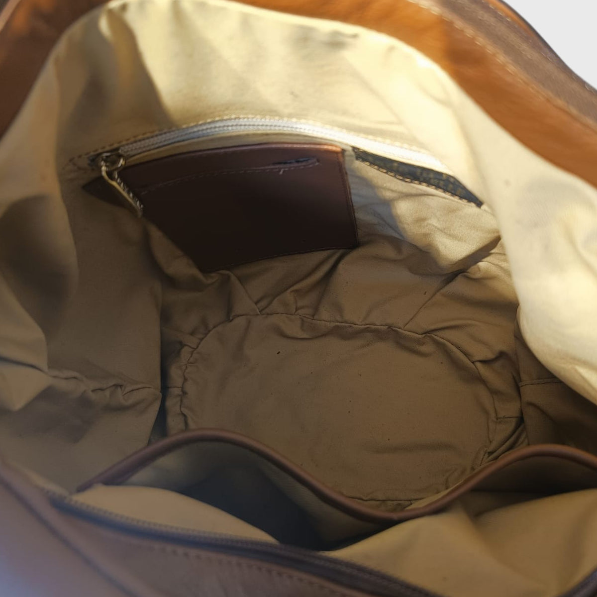 Pelletteria Pelle Nuda Milano, Vera pelle italiana, Negozio borse donna, Sacca Croce marrone