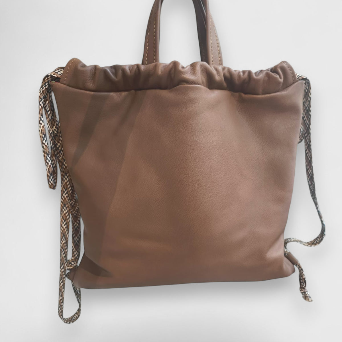 Pelletteria Pelle Nuda Milano, vera pelle italiana, Negozio borse donna, Sacca zaino marrone