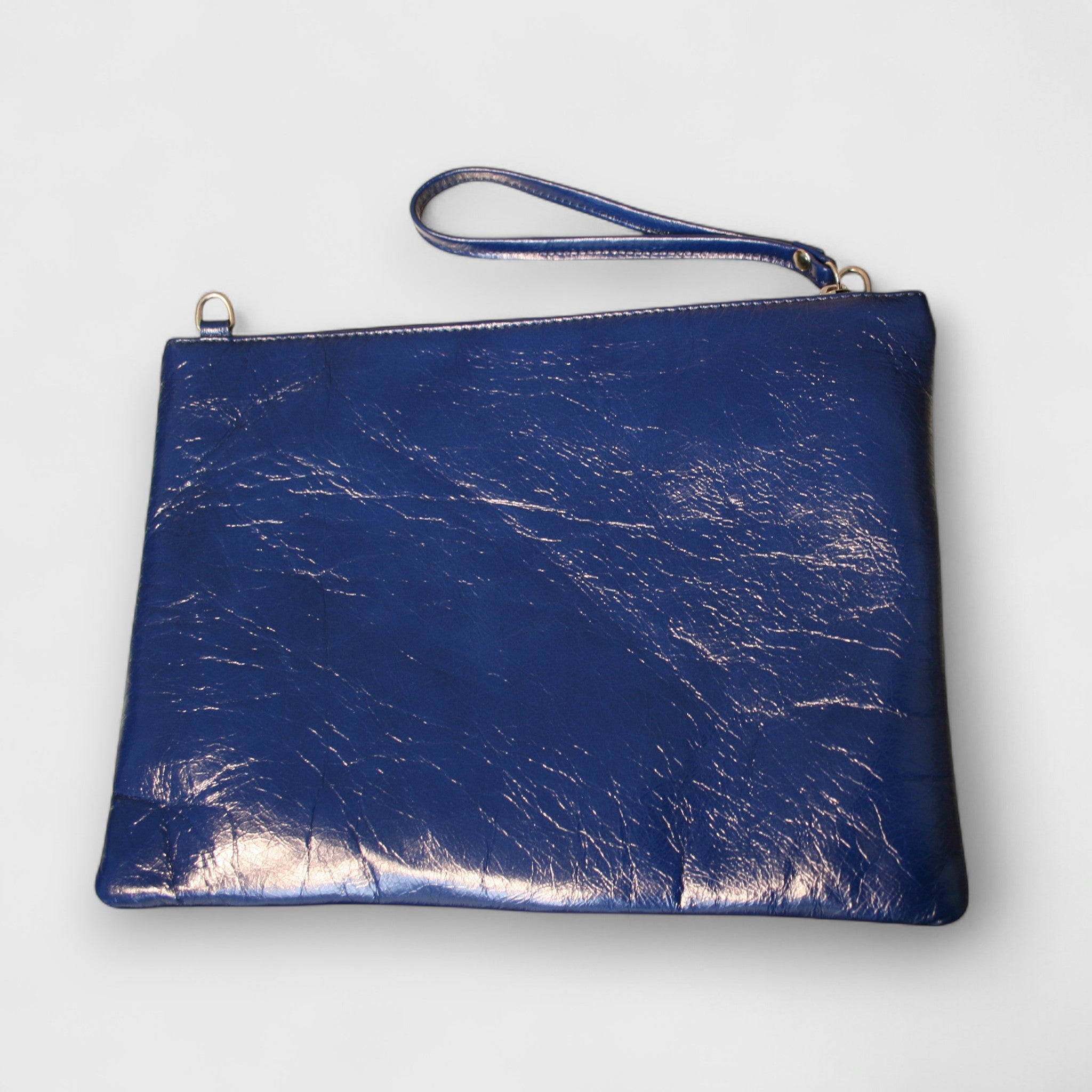 Pelletteria Pelle Nuda Milano, Artigianato Italiano, Vera pelle, Negozio borse donna, Trousse Clara blu