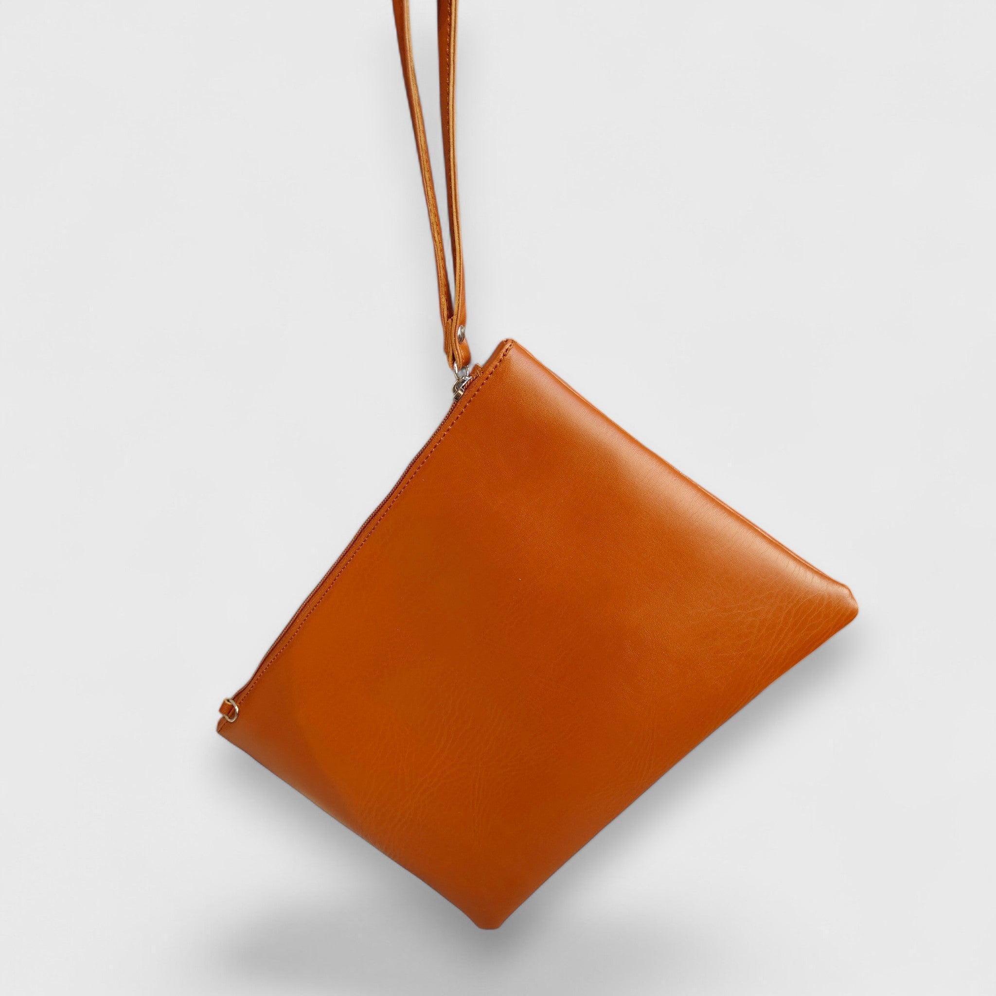 Pelletteria Pelle Nuda Milano, Vera pelle italiana, Negozio borse donna, Trousse Clara marrone