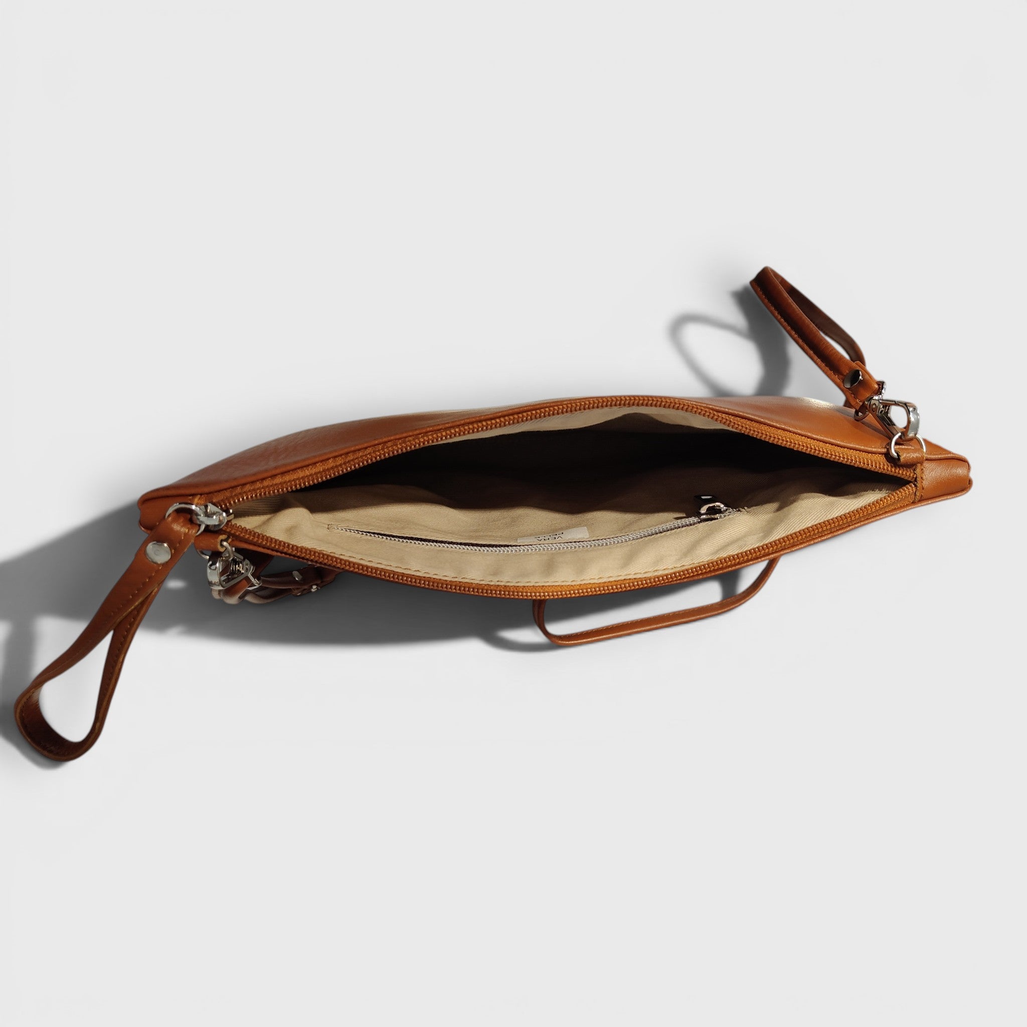 Pelletteria Pelle Nuda Milano, Vera pelle italiana, Negozio borse donna, Trousse Clara marrone