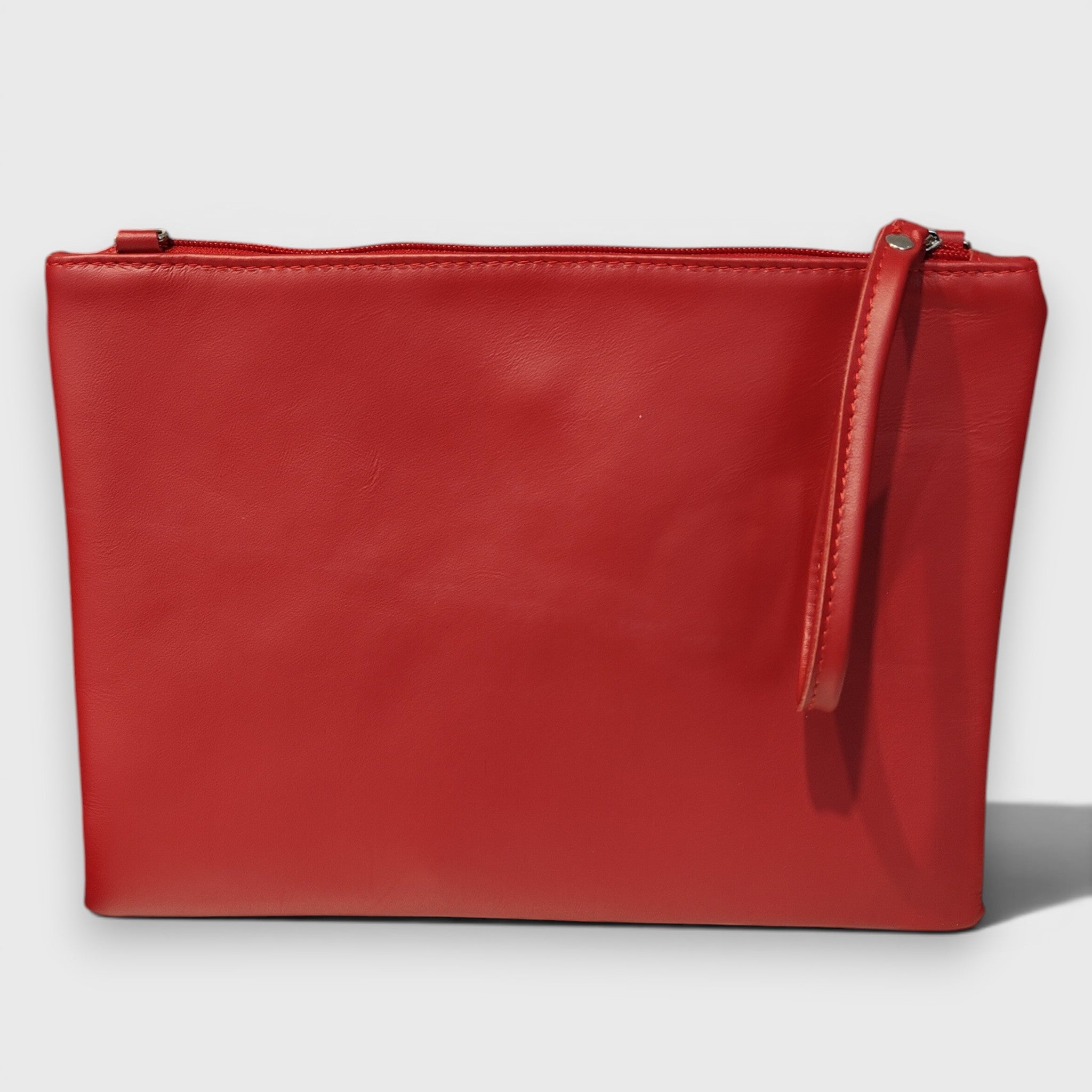 Pelletteria Pelle Nuda Milano, Vera pelle Italiana, Negozio borse donna, Trousse Clara rosso