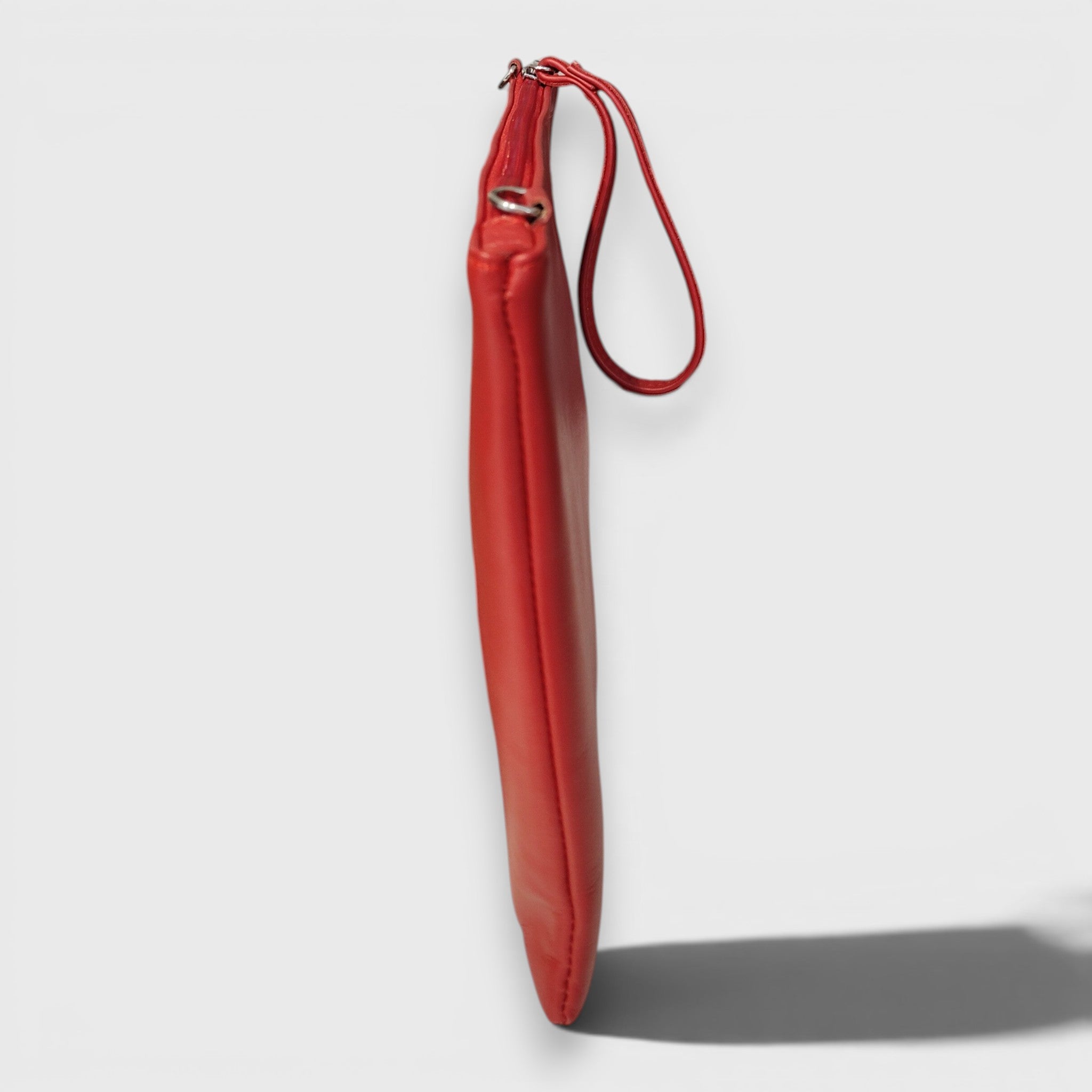 Pelletteria Pelle Nuda Milano, Vera pelle Italiana, Negozio borse donna, Trousse Clara rosso