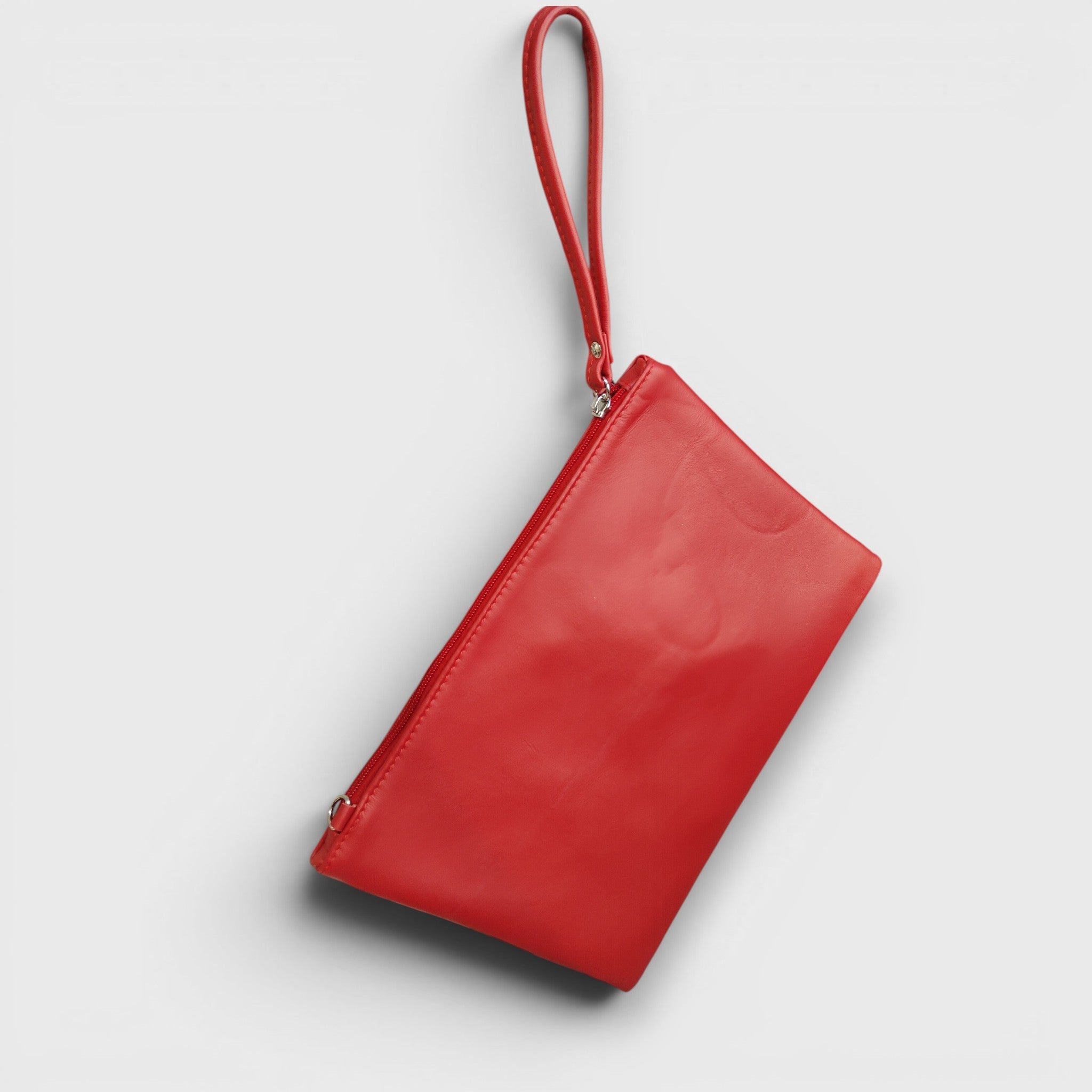 Pelletteria Pelle Nuda Milano, Vera pelle Italiana, Negozio borse donna, Trousse Clara rosso
