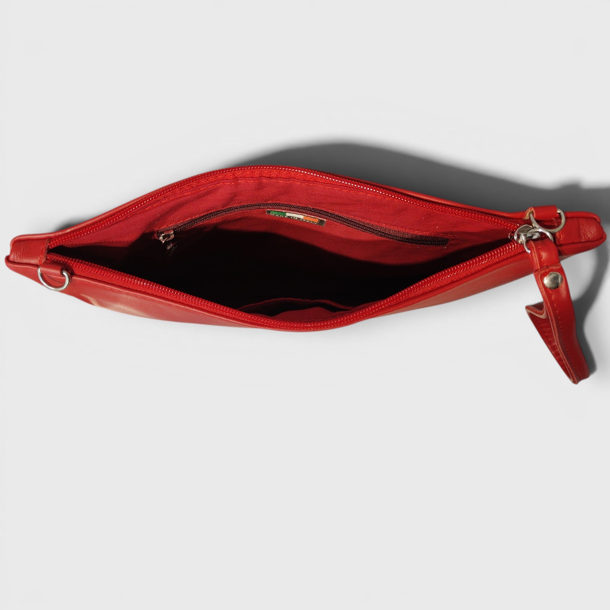 Pelletteria Pelle Nuda Milano, Vera pelle Italiana, Negozio borse donna, Trousse Clara rosso