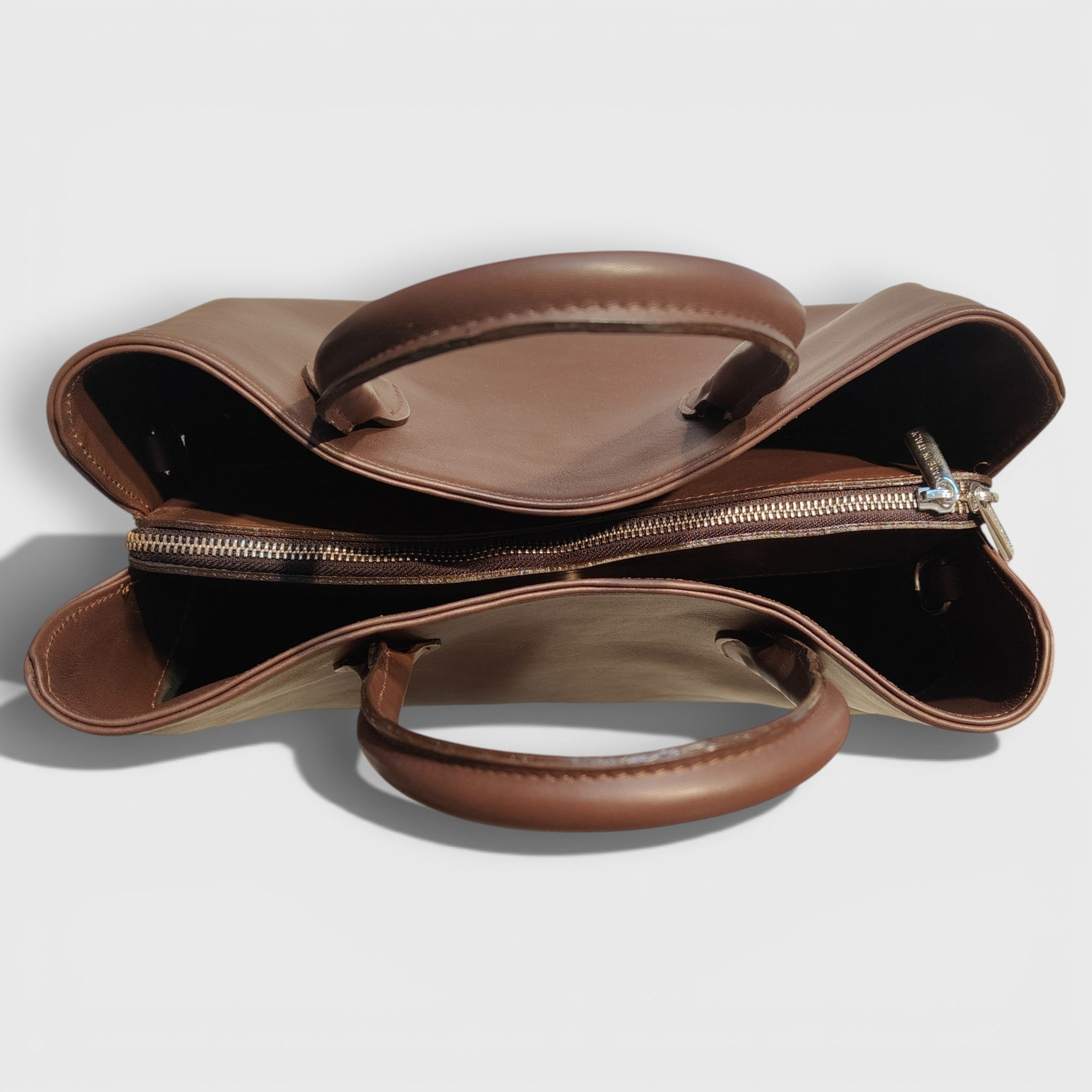 Pelletteria Pelle Nuda Milano, Artigianato Italiano, Vera pelle, Negozio borse donna, Venezia marrone