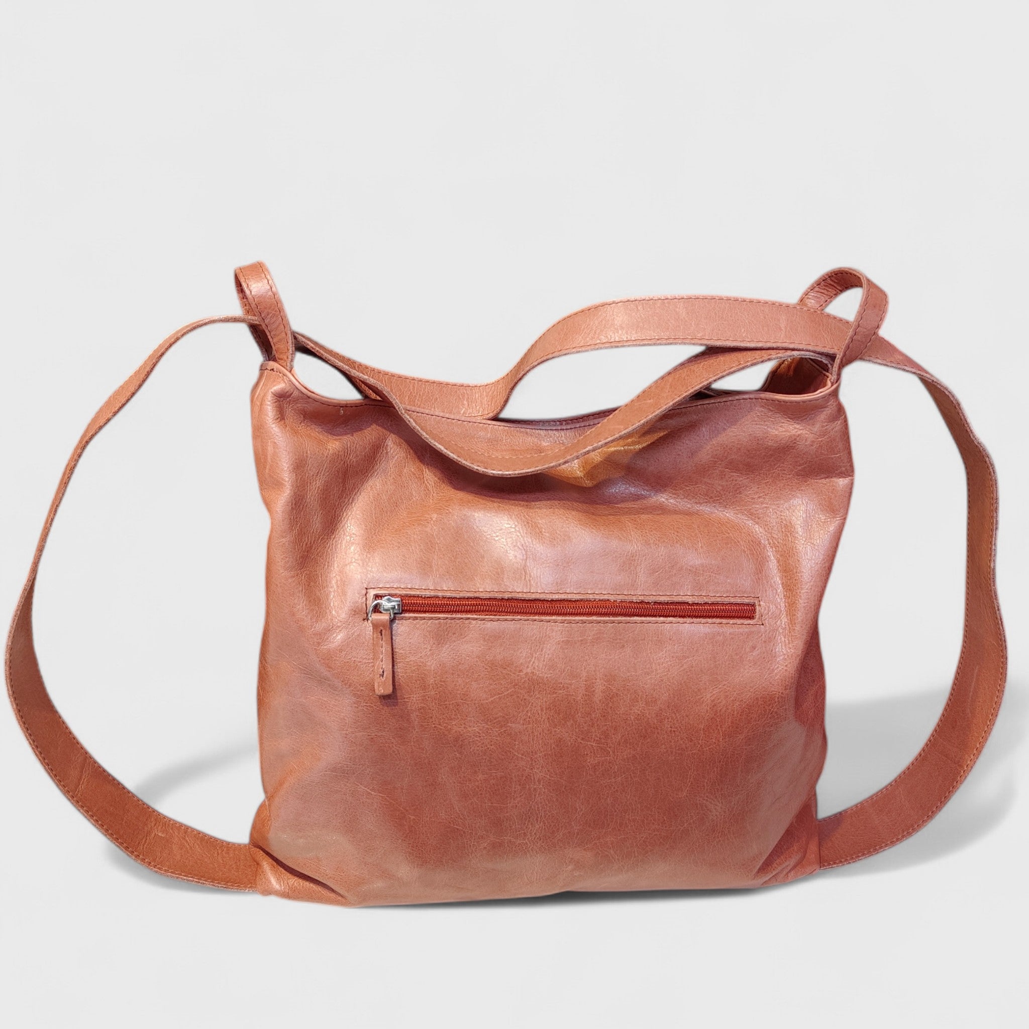 Pelletteria Pelle Nuda Milano, Artigianato Italiano, Vera pelle, Negozio Borse donna, Zaino Roma marrone rosato