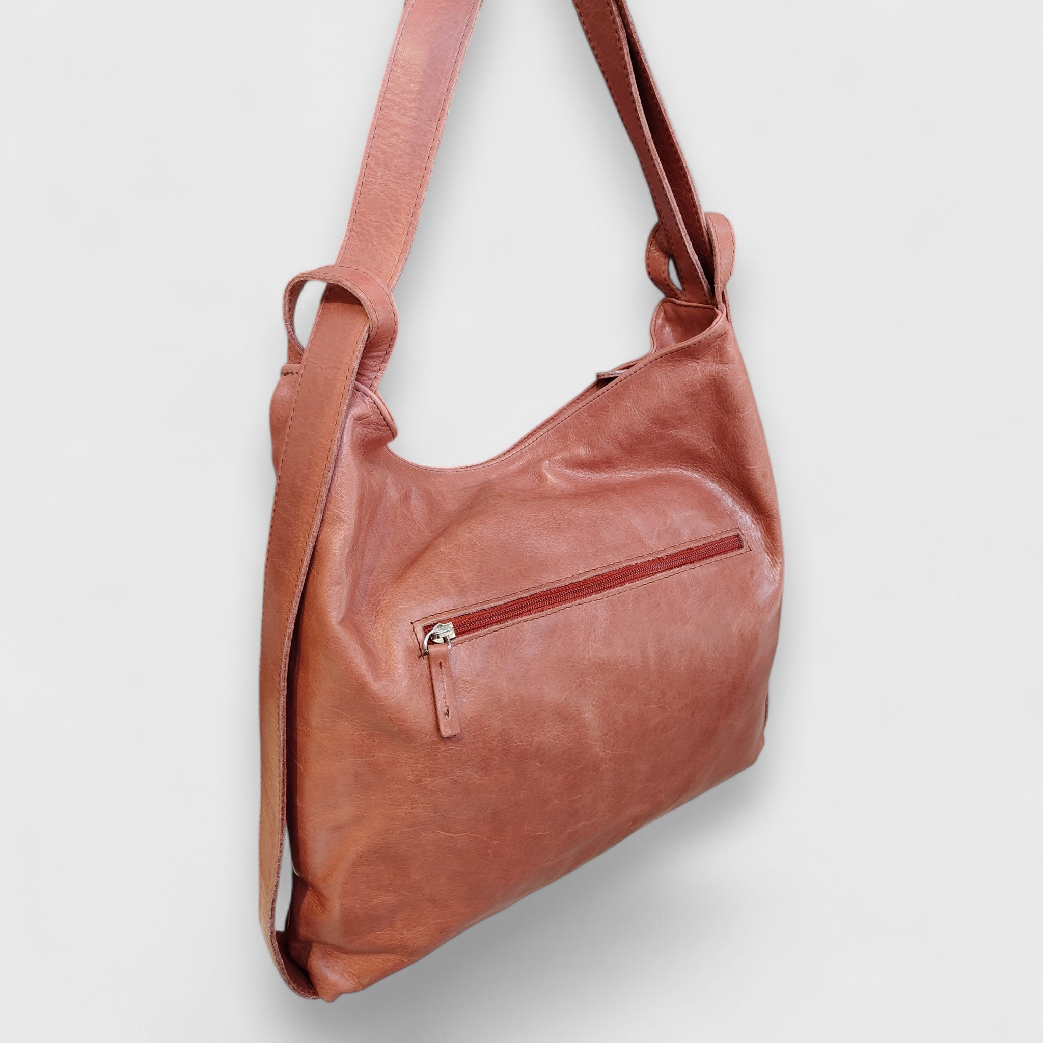 Pelletteria Pelle Nuda Milano, Artigianato Italiano, Vera pelle, Negozio Borse donna, Zaino Roma marrone rosato