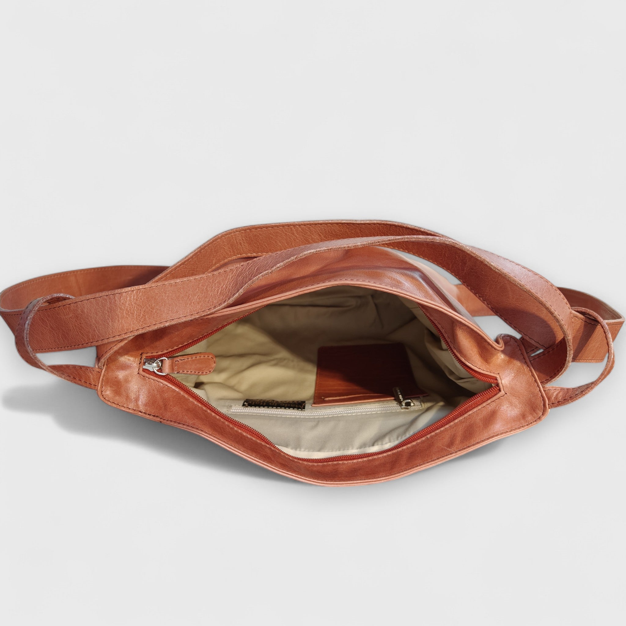 Pelletteria Pelle Nuda Milano, Artigianato Italiano, Vera pelle, Negozio Borse donna, Zaino Roma marrone rosato