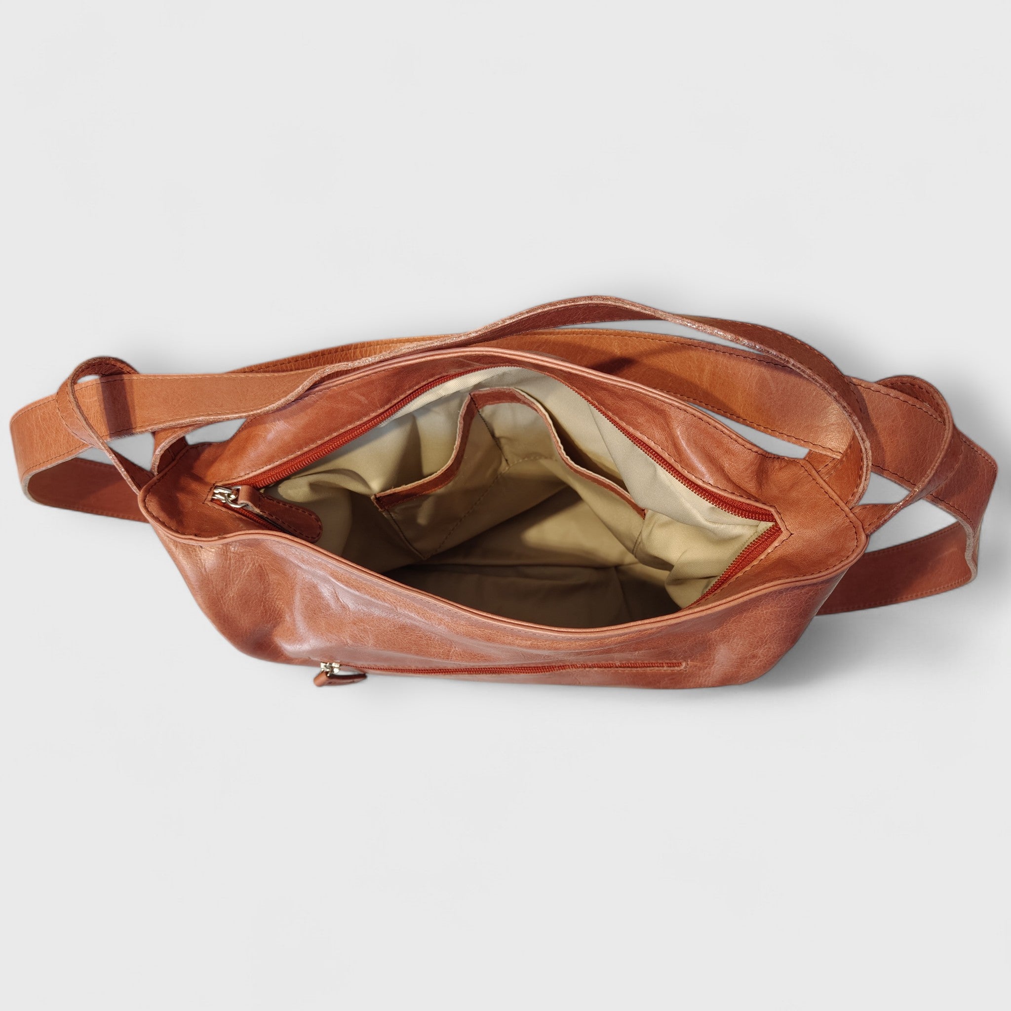 Pelletteria Pelle Nuda Milano, Artigianato Italiano, Vera pelle, Negozio Borse donna, Zaino Roma marrone rosato