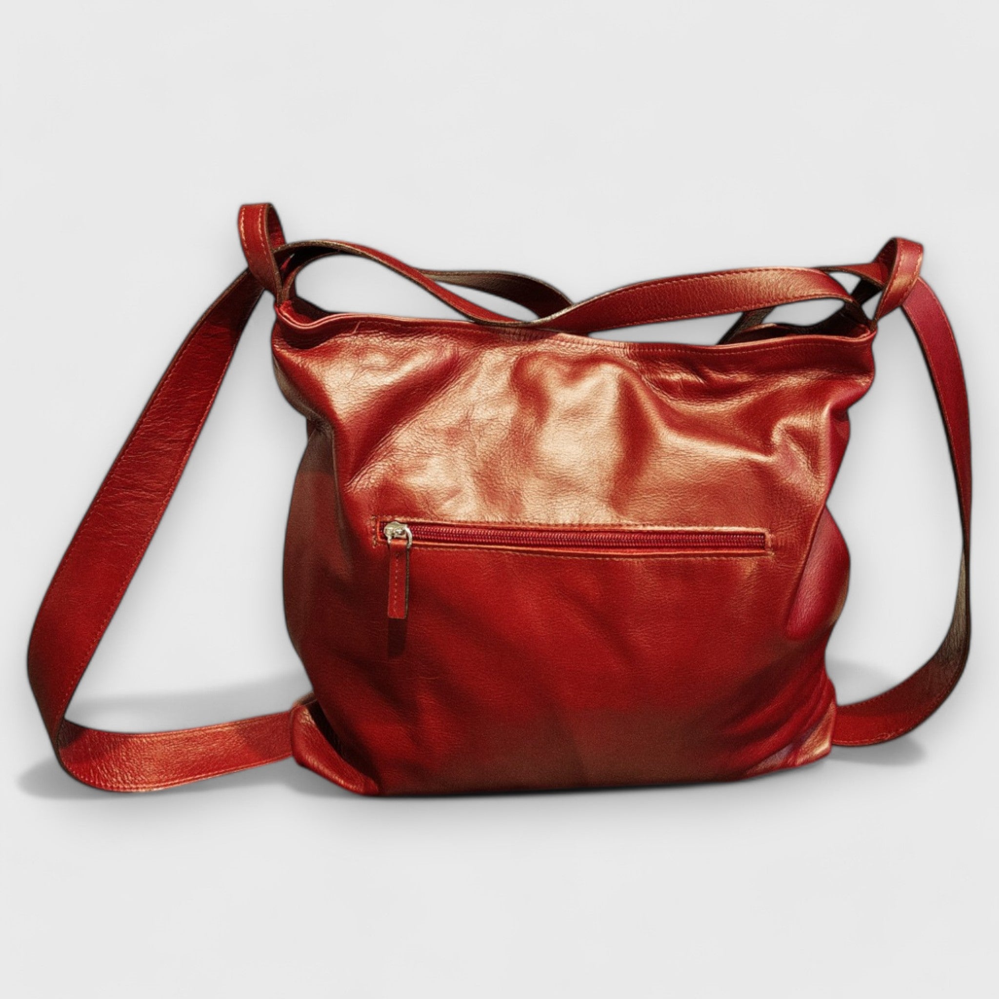 Pelletteria Pelle Nuda Milano, Artigianato italiano, vera pelle, negozio borse donna, Zaino Roma rosso