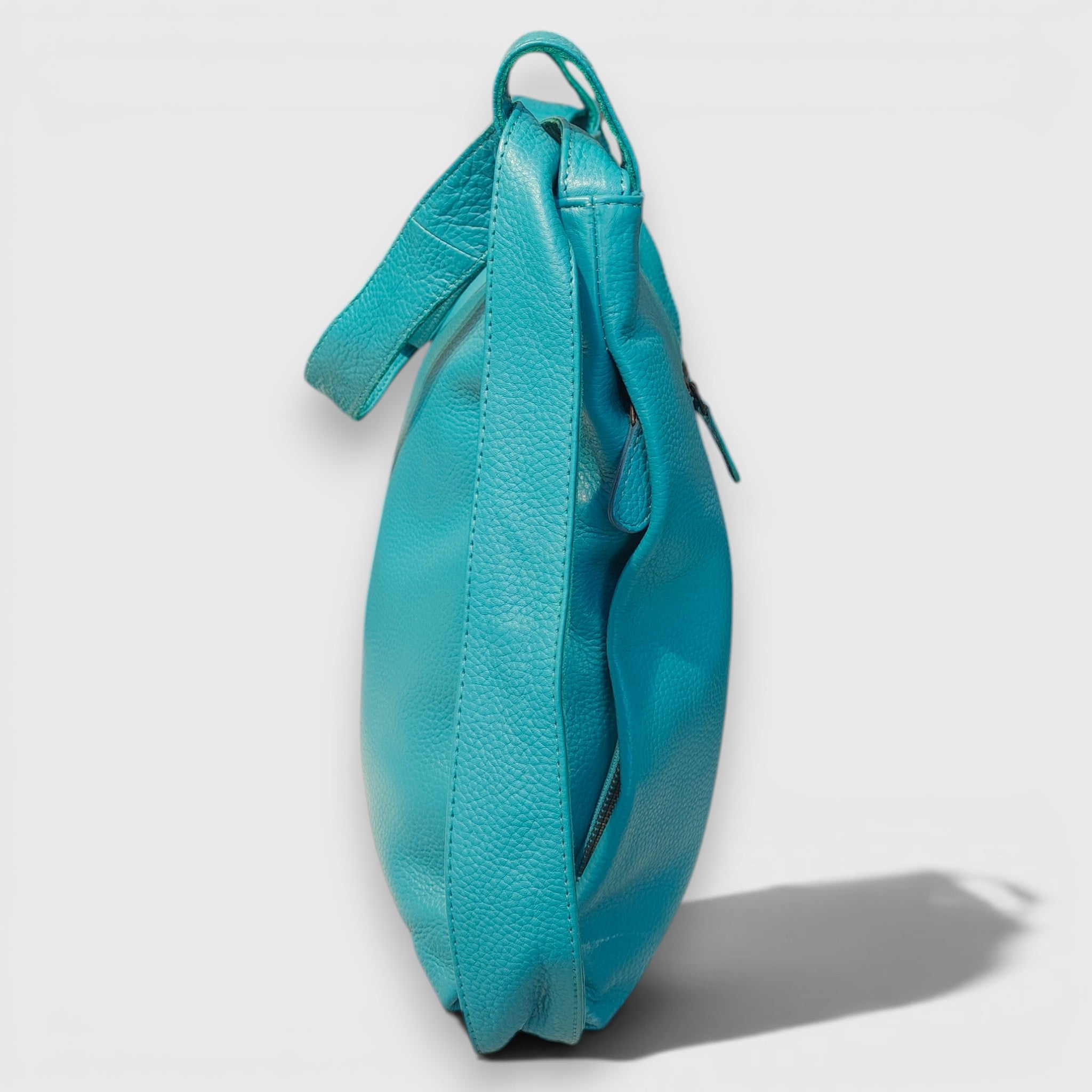 Pelletteria Pelle Nuda Milano, Vera pelle italiana, Negozio borse donna, Zaino Roma turchese