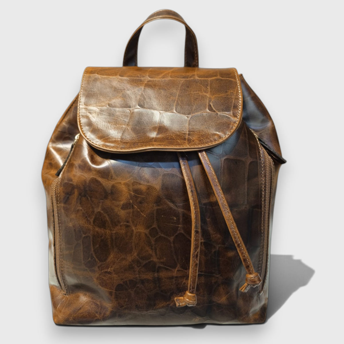 Pelletteria Pelle Nuda Milano, Vera pelle Italiana, Negozio borse donna, Zaino tappo marrone cocco