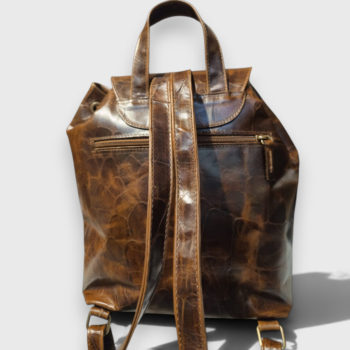 Pelletteria Pelle Nuda Milano, Vera pelle Italiana, Negozio borse donna, Zaino tappo marrone cocco