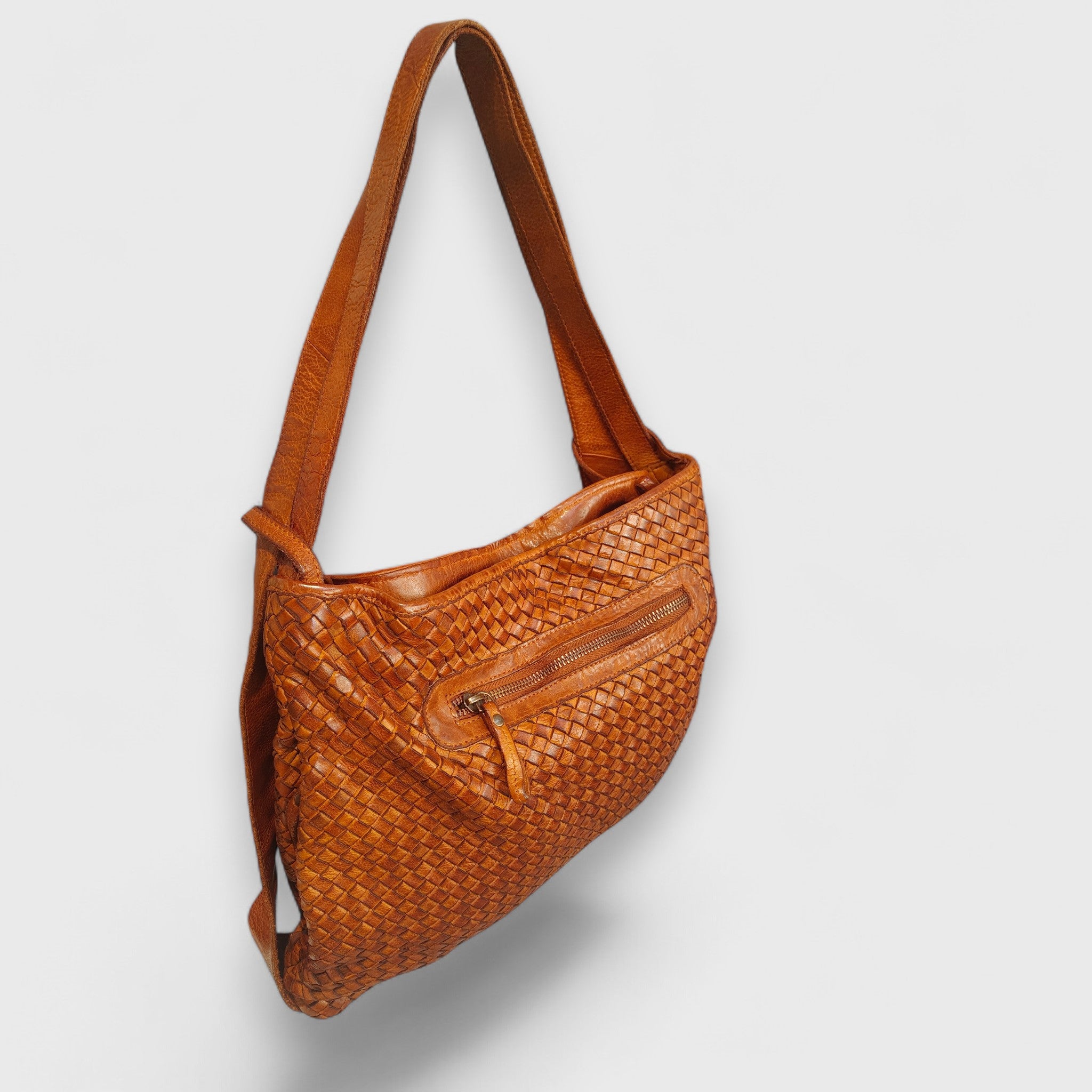 Pelletteria Pelle Nuda Milano, Vera pelle italiana, Borse donna, Zaino roma intrecciato marone