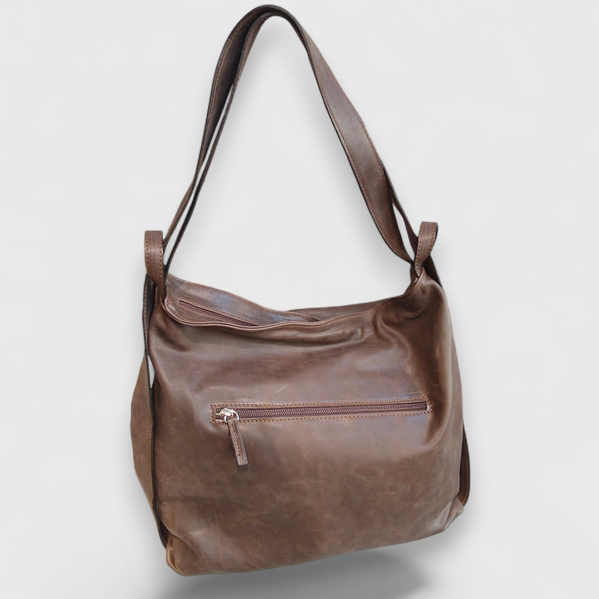 Pelletteria Pelle Nuda Milano, Vera pelle italiana, Negozio borse donna, Zaino Roma marrone