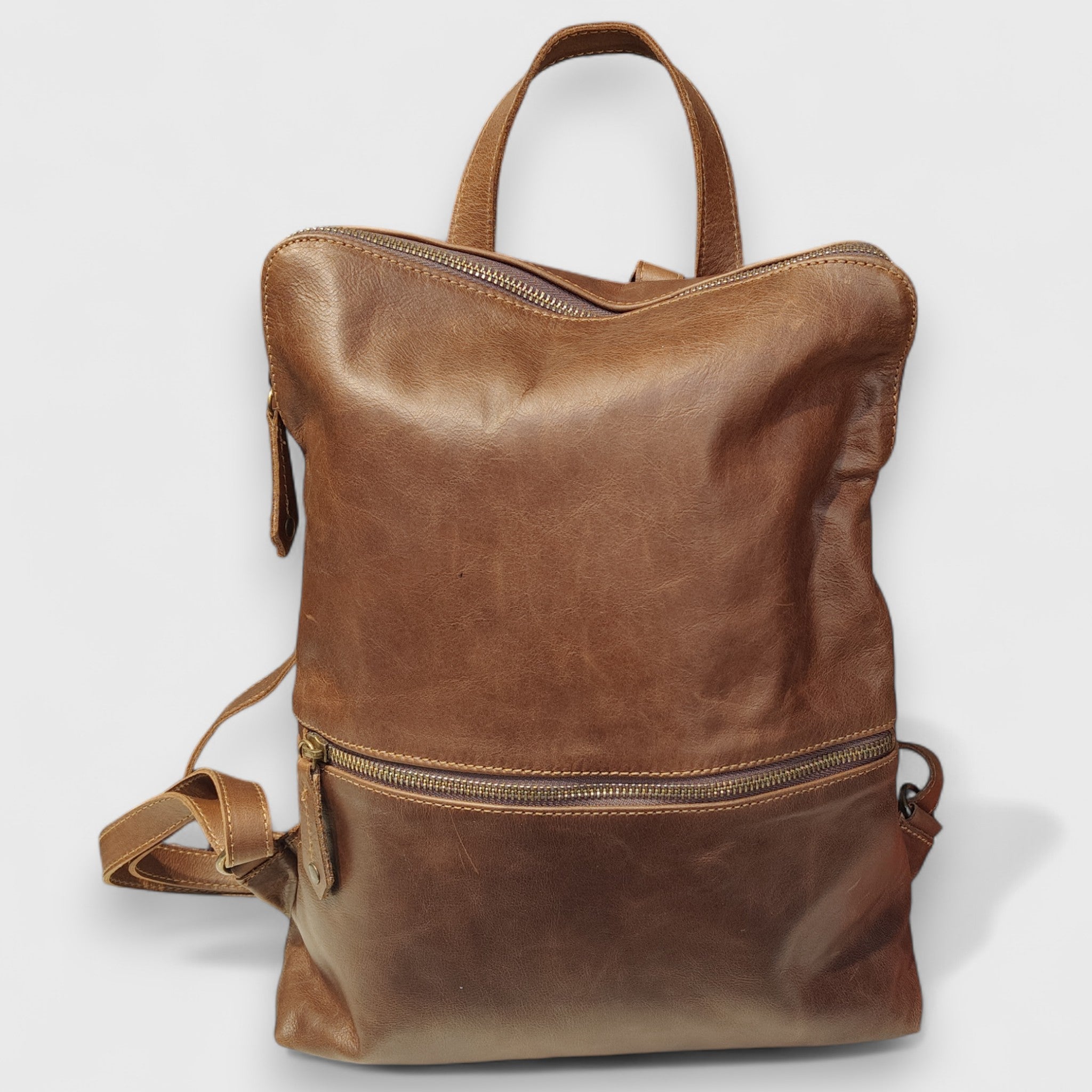 Pelletteria Pelle Nuda Milano, Artigianato Italiano, Vera pelle, Negozio borse donna uomo, Zaino Genova marrone