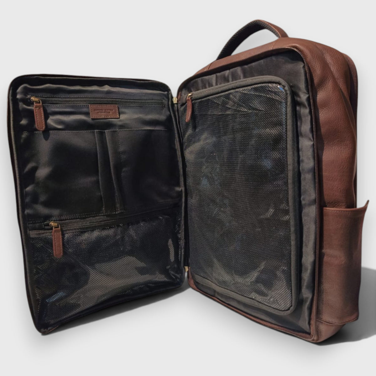 Pelletteria Pelle Nuda Milano, Vera pelle Italiana, Negozio borse uomo donna, Zaino travel marrone